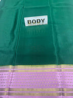 Green fabric with a label labeled 'BODY' and a purple border with gold stripes.