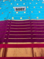 Blue and purple saree with gold accents and a 'BODY' label.
