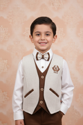 Boy wearing cream and brown three-piece formal outfit