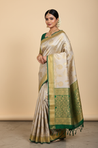 Cream & Emerald Green Banarasi Silk Saree - Model Wearing
