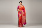Indian Female Model in Orange-Red Kanchipuram Silk Saree