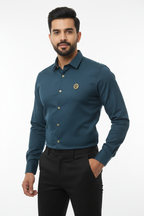 Indian Male Model in Dark Teal Petrol Blue Shirt with Gold Badge