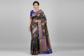 Indian Model Wearing Black Silk Saree with Gold Butta and Blue Border