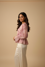 Indian model wearing dusty pink botanical print peplum blouse