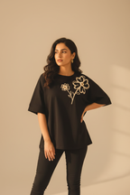Indian model wearing floral embroidery t-shirt