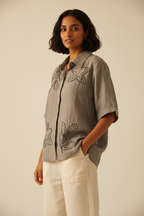 Indian model wearing grey linen kantha embroidery shirt