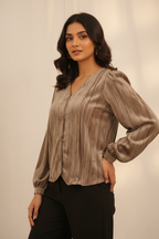 Indian model wearing taupe crinkle button-down blouse