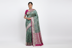 Indian Model Wearing Teal Green Floral Jaal Saree with Magenta Border
