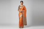 Indian Model Wearing Vibrant Orange Silk Saree with Silver Floral Jaal