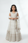 Kid wearing white lehenga
