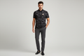 Male model wearing abstract print polo shirt