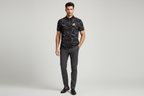 Male model wearing abstract print polo shirt