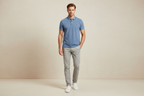 Male model wearing blue polo shirt