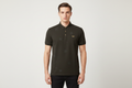 Male model wearing dark olive jacquard polo