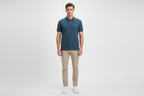 Male model wearing dark teal polo