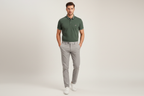 Male model wearing green polo shirt