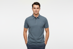 Male model wearing slate blue-grey polo