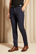 Model in aesthetic pose wearing navy formal trousers, lower body