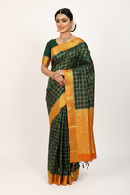 Model in Dark Green Mysore Silk Saree with Orange Border