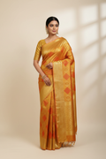 Model in Gold Tissue Silk Kanjivaram Saree