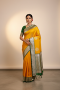 Model in Mango Yellow Banarasi Saree