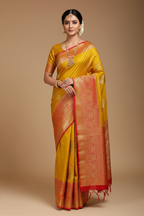 Model in Mustard Yellow and Red Banarasi Saree