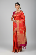 Model in Red and Magenta Silk Saree