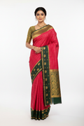 Model in Rose Pink Mysore Silk Saree with Green Elephant Border