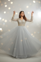 Model in Silver Grey Tulle Gown with Gold Embellishments