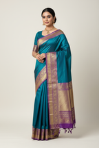 Model in Teal and Gold Tissue Silk Saree