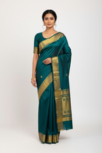 Model in Teal Mysore Silk Saree with Gold Stripe Border and Matching Blouse