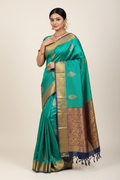 Model in Teal Silk Saree