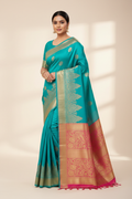 Model in Turquoise Temple Border Banarasi Saree