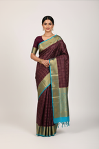 Model in Wine Purple Mysore Silk Saree with Turquoise Elephant Border