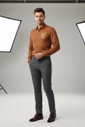 Model wearing brown eagle shirt
