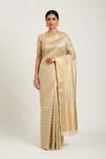 Model wearing champagne gold herringbone Banarasi saree