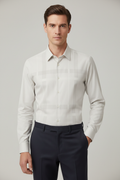 Model wearing cream check shirt