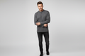 Model wearing dark grey Galani long sleeve Henley