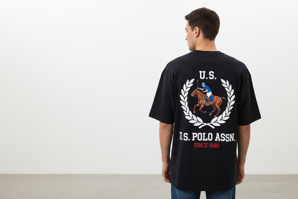 Model wearing dark navy U.S. Polo Assn. t-shirt - back