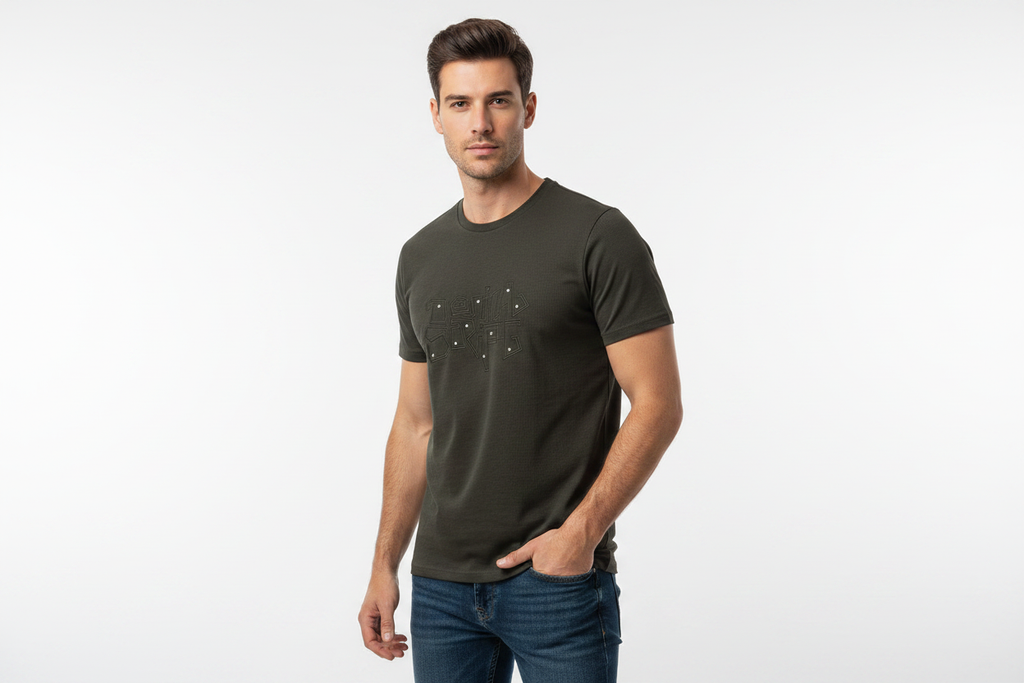 Model wearing dark olive graphic t-shirt