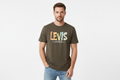 Model wearing dark olive Levi's multicolor graphic t-shirt