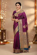 Model wearing deep wine purple Kanchipuram silk saree with grand antique gold zari Yali border