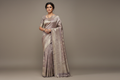 Model wearing Dusty Mauve Silver Tissue Silk Saree