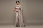 Model wearing Dusty Mauve Silver Tissue Silk Saree