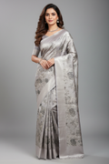Model wearing lavender grey silver floral print tissue saree