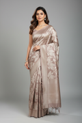Model wearing lavender mauve silver zari brocade saree