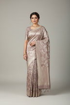 Model wearing mauve Banarasi tissue saree