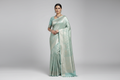 Model wearing Mint Silver Tissue Silk Saree