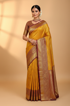 Model wearing Mustard Yellow Banarasi Saree