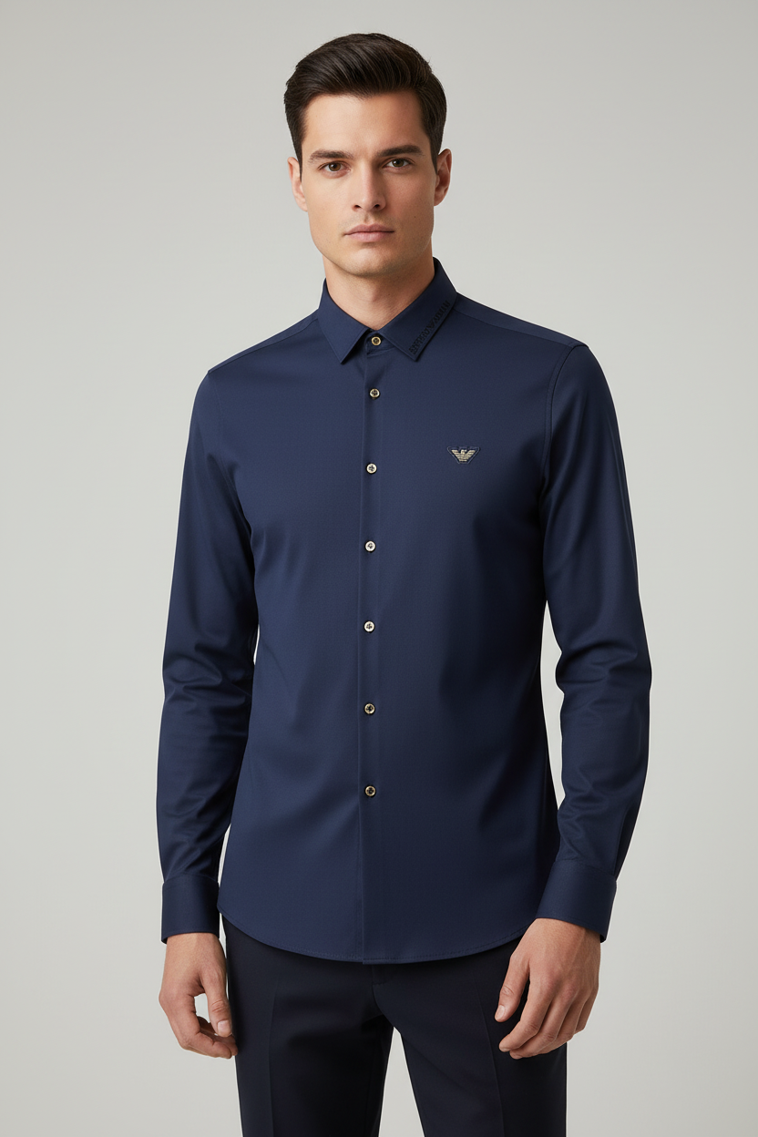 Model wearing navy blue eagle logo shirt